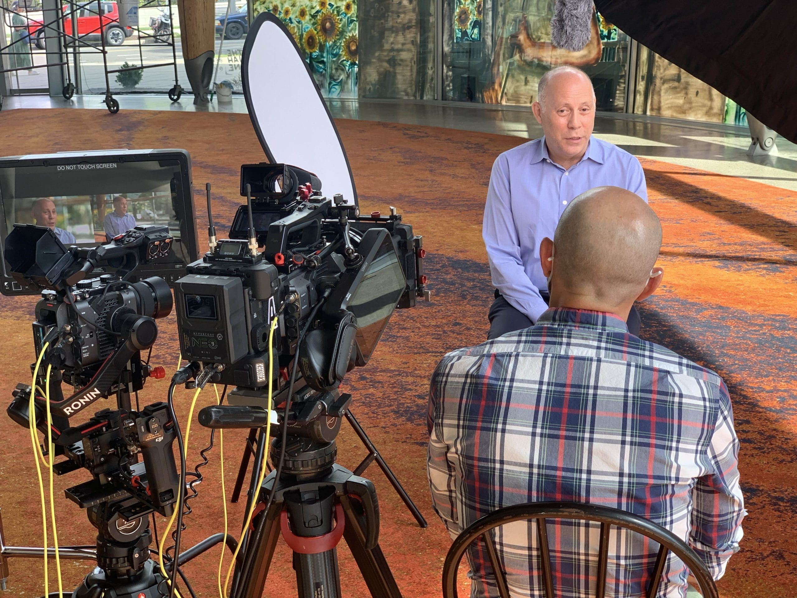 Interview on camera in digital production studio